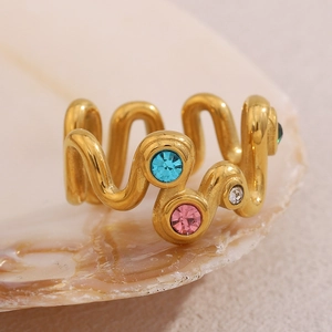 Wave-shaped 18K gold plated stainless steel ring with colorful zircon stones on a shell