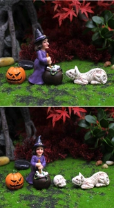 Makro-Detail von Miniatur Halloween-Resin-Set mit Hexe, Kürbis und Totenkopf Figuren