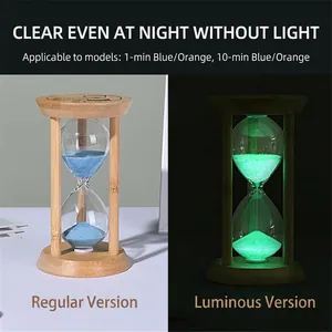 Luminous glass hourglass timer with wood frame showing day and night glowing effects