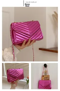 Detailed views of rose red crossbody bag with V-shaped quilting and golden chain strap