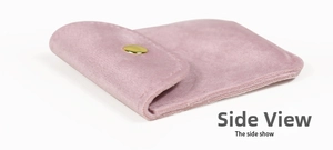 Side view of soft pink velvet jewelry pouch with elegant gold snap button closure
