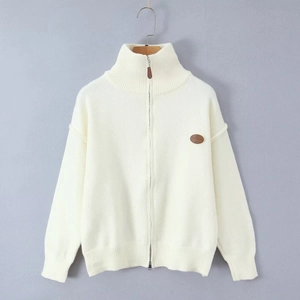 Women's cream zip-up knit cardigan with high collar and faux leather chest patch