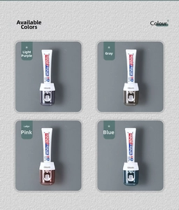 Four color options of automatic toothpaste dispensers in purple, grey, pink, and blue