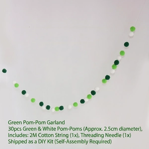DIY party banner featuring green and white 2.5cm pom poms with 2m cotton rope