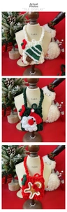 Detailed view of hand-knitted Christmas gingerbread man and tree bag charms