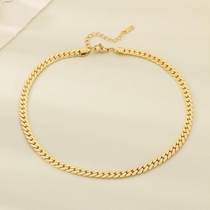 Close-up of golden flat snake chain with secure lobster clasp and adjustable link