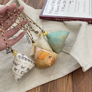 Handcrafted Zongzi pyramid pendants with traditional patterns and colorful cords