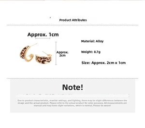 Detail view of gold leopard enamel C-shaped earrings with size and weight specs