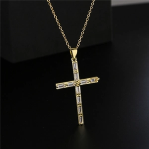 Gold-plated cross necklace for women featuring baguette-cut zircon stones on an O-chain