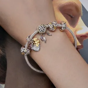 Armband aus 925 Silber mit goldenen Bienen, Gänseblümchen und Sonnenblumenherz