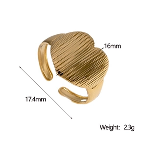 Detailed view of gold heart ring with vertical texture and dimensions of 16mm width