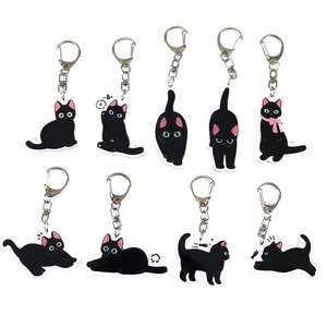 Set of 9 cute cartoon black cat acrylic keychains in various playful poses and designs