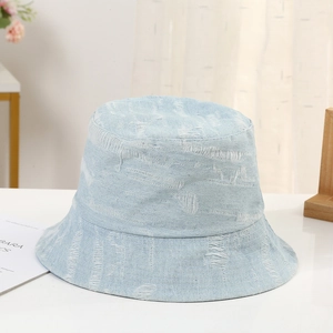 Fashionable light blue distressed denim bucket hat for summer sun protection outdoors