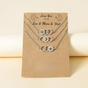 Three-piece stainless steel necklace set with sun moon and star engraved circle charms