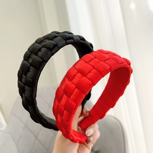 Handmade woven wide headband in black and red satin fabric with a thick braided design