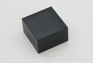 Close-up of black lychee texture faux leather watch box with clamshell lid design
