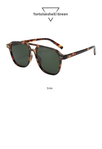 Side view of retro double bridge sunglasses with tortie frame and green lenses