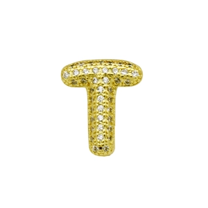 Close-up of golden letter T charm with sparkling white zircon honeycomb pave setting