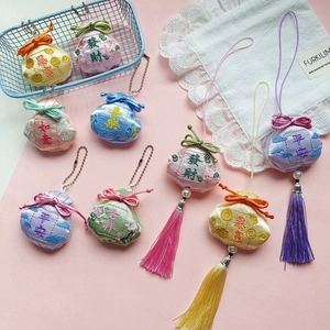 Colgantes de bolsa de la fortuna bordados con borlas de seda y motivos chinos tradicionales