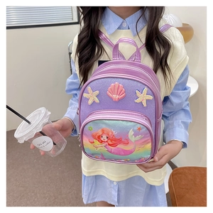 Detail view of purple mermaid backpack with sequins and decorative sea shells