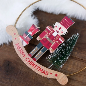 Nutcracker wooden Christmas tree ornament with Merry Christmas text on rustic wood background