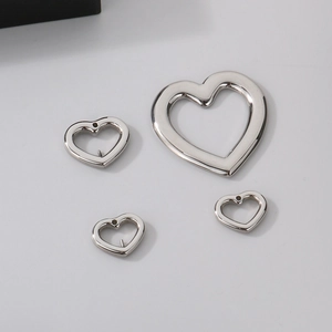 Set of stainless steel heart pendants in silver finish showing large and small sizes