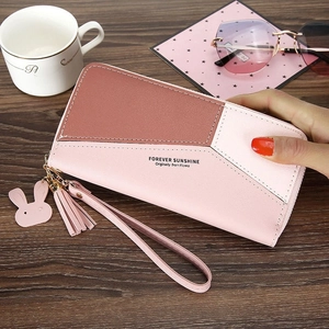 Women's long zip-around PU leather wallet with patchwork design and tassel charm