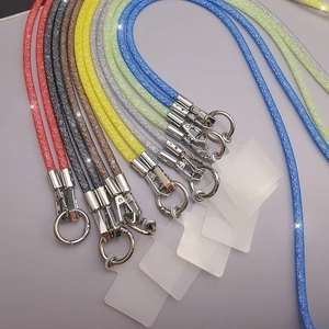 Colorful rhinestone braided phone lanyards with metal clips and clear patches in various hues