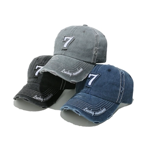 Vintage washed cotton baseball caps with distressed holes and number 7 embroidery detail