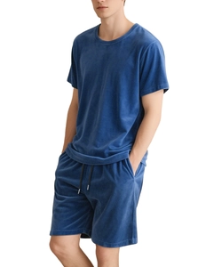 Detail of blue velvet short sleeve and shorts set showing soft fabric texture