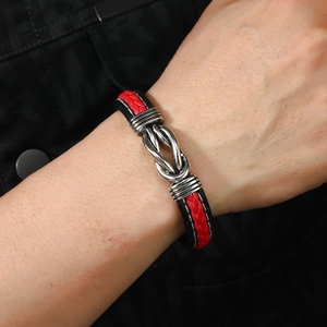 Men's braided leather bracelet with silver infinity knot and magnetic metal clasp