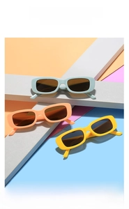 Vibrant blue orange and yellow kids rectangular sunglasses with dark lenses