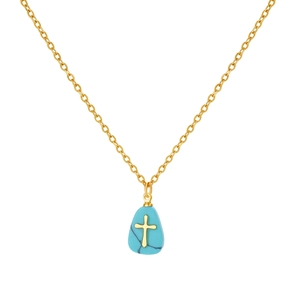 Detail of turquoise teardrop pendant with gold cross on stainless steel chain