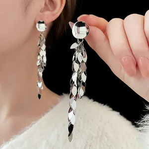 Silver leaf sequin tassel drop earrings with long metallic fringe for elegant styling