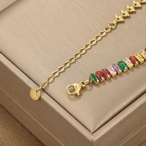 Elegant gold titanium steel bracelet with colorful rectangular cubic zirconia in a gift box