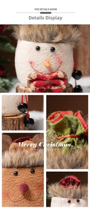 Detail showing plush Christmas gift bag with knitted stripes, bells, and deer embroidery