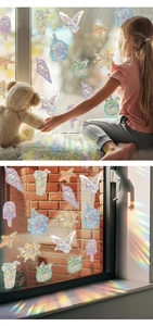 Detailed suncatcher stickers showing rainbow prism effects on glass with floral patterns
