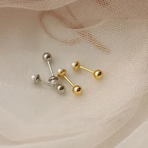 Minimalist pearl screw back stud earrings in gold and silver finish on lace fabric