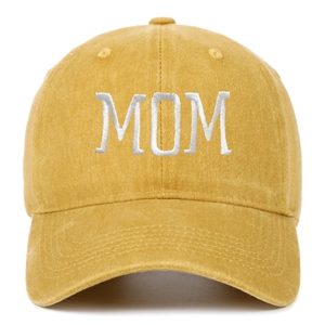 Close-up of MOM embroidery and fabric texture on yellow cotton baseball cap