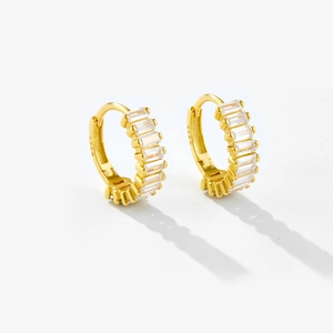 Close-up of S925 hallmark on gold hoop earrings with rectangle cubic zirconia stones