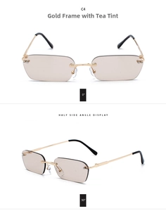 Detail of rimless rectangle sunglasses with gold metal temples and tinted tea lenses