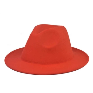 Close-up of red wool felt fedora featuring a classic flat brim and stylish metal belt buckle