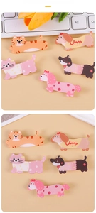 Detailed close-up of cute cartoon acrylic animal hair clips and brooch pins set
