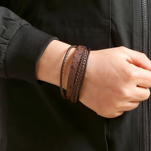 Men's multi-layer woven brown leather bracelet with braided textures and metal accents