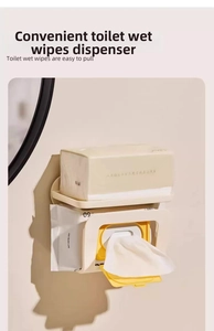 Detail of wall-mounted wipes dispenser with top storage shelf and yellow dustproof lid