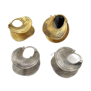 Chic metallic wavy textured hoop earrings in gold and silver finish for women