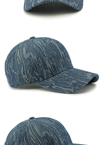 Detailed close-up of blue denim baseball cap featuring unique wave pattern texture