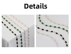 Detail of 14K gold plated chain with rectangular green and pink beads and copper beads
