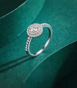 Macro detail of a S925 sterling silver ring featuring a sparkling double halo diamond setting