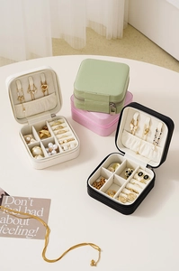 Portable PU leather jewelry organizer boxes in four colors with necklace hooks and ear stud slots